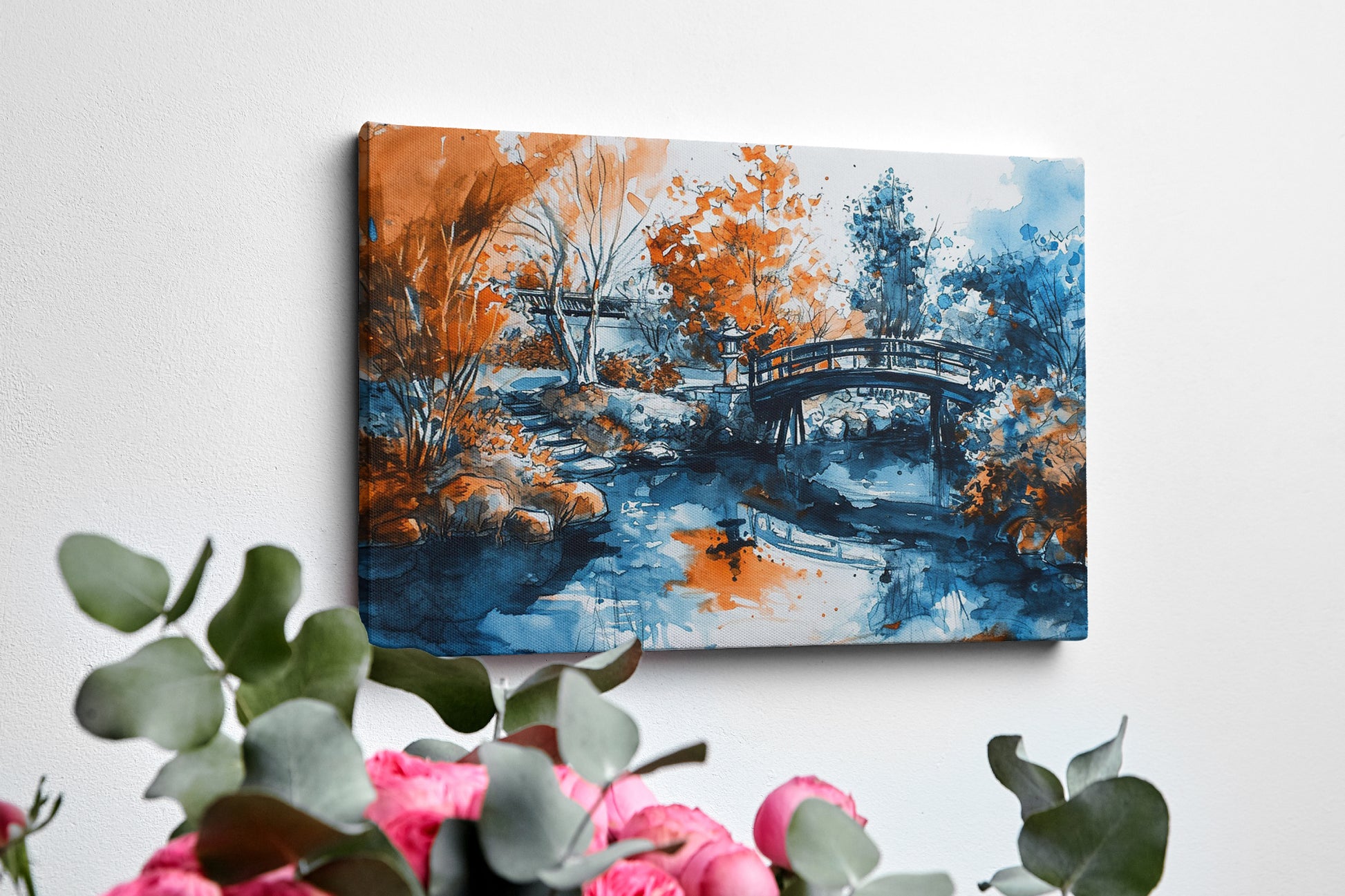 Framed canvas print of an Oriental garden scene with a bridge over water in autumnal hues of orange and blue