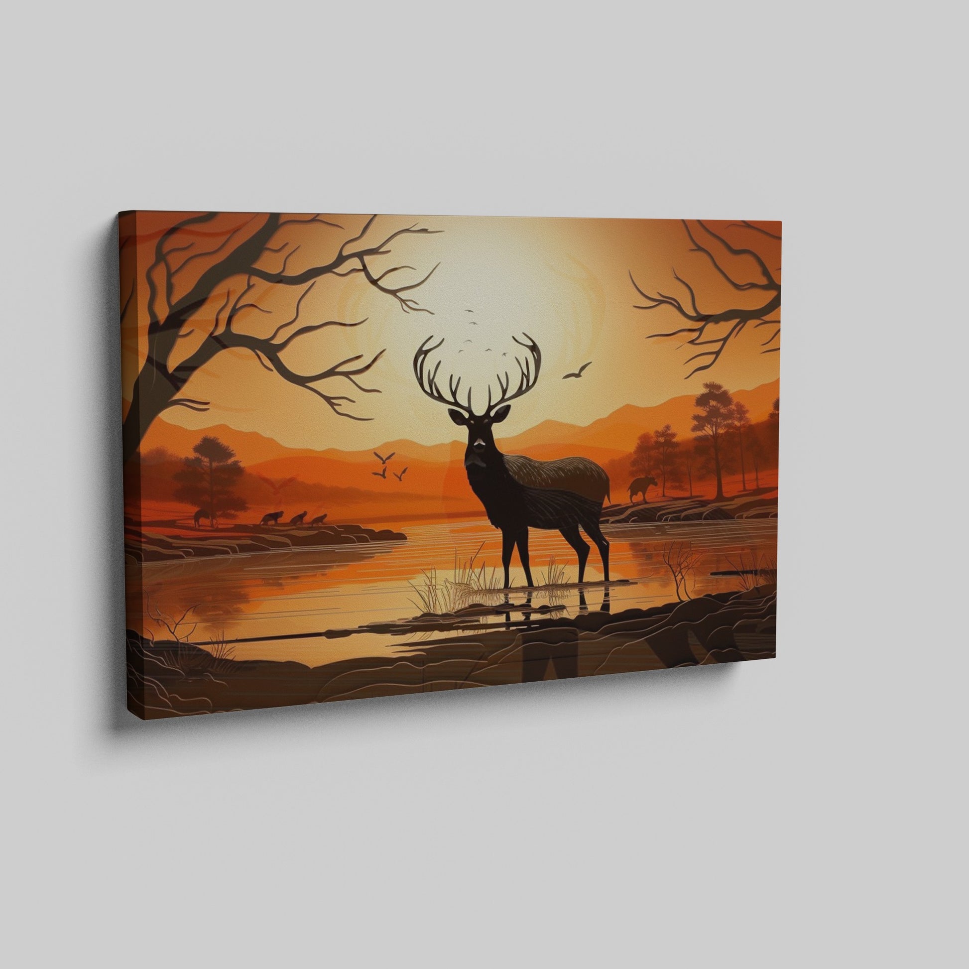 Printed canvas art of a black deer silhouette against an orange sunset with trees and mountains