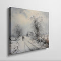 Framed canvas print of a snowy countryside scene with walking figures and a rustic cottage