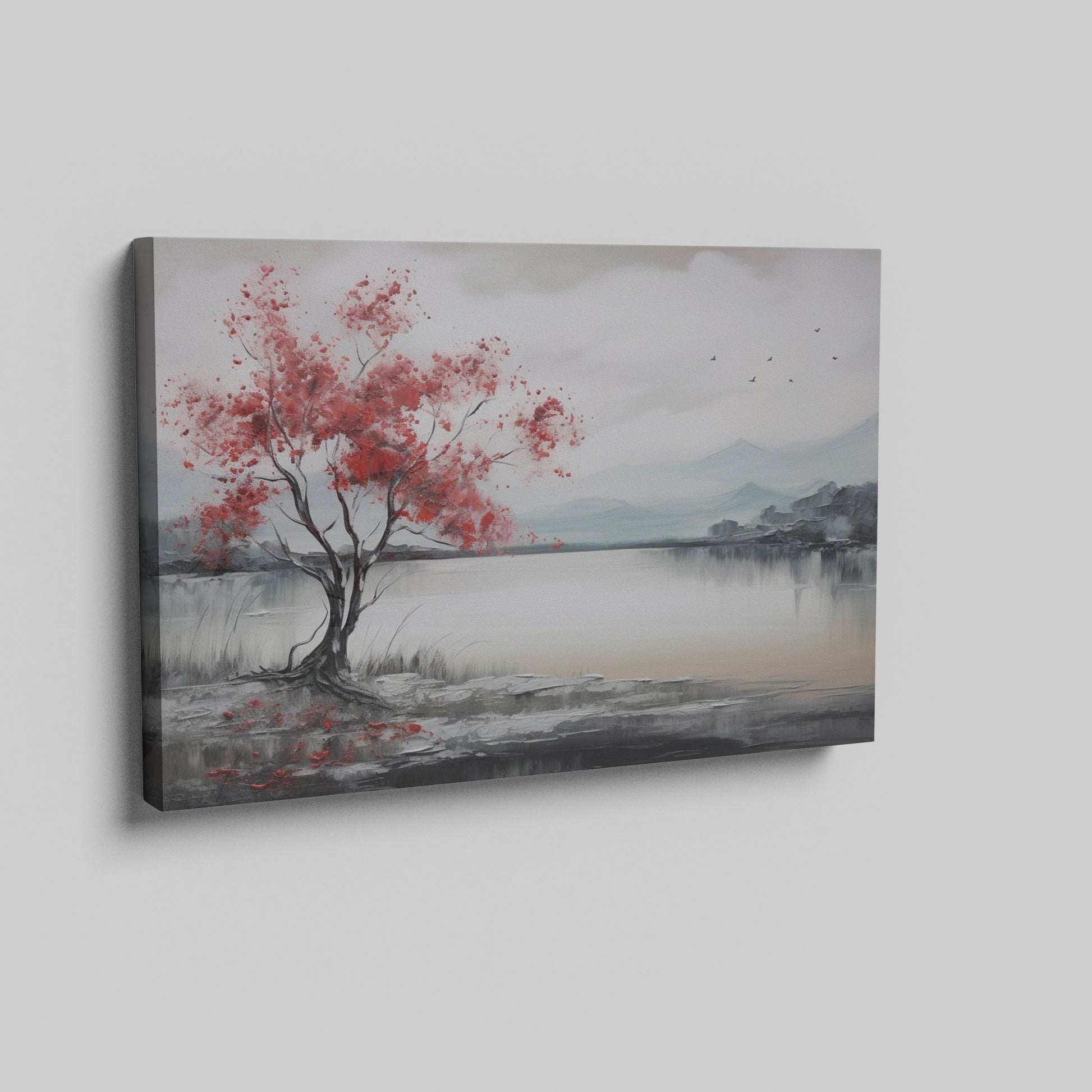 Framed canvas print of a serene landscape painting showcasing a vibrant red tree against a monochrome backdrop with flying birds