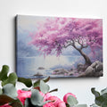 Framed canvas print of a cherry blossom tree by a lake with vivid pink flowers and tranquil blue waters