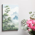 Framed canvas print of a misty bamboo forest with mountain peaks in the background