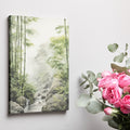 Framed canvas print of a misty bamboo forest with a gentle waterfall and rocks