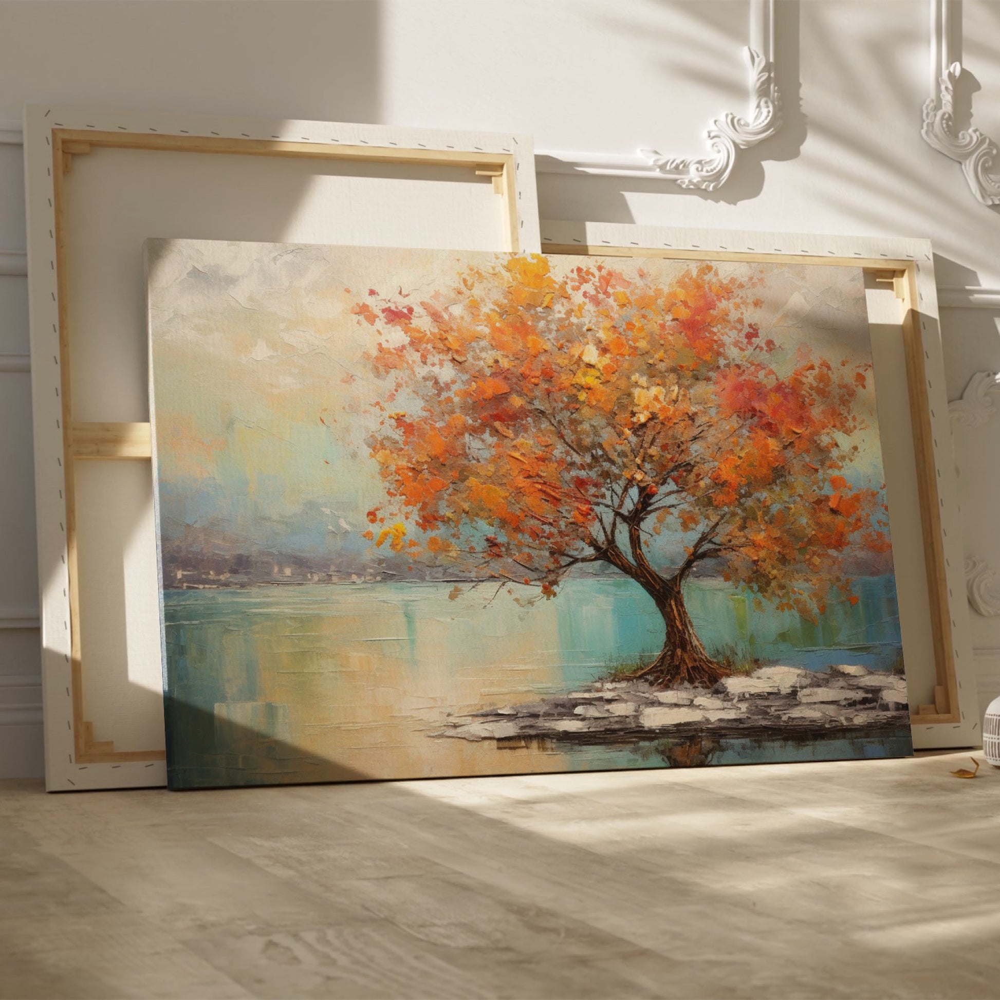 Framed canvas print of a textured autumnal tree with orange and gold foliage by a serene lake