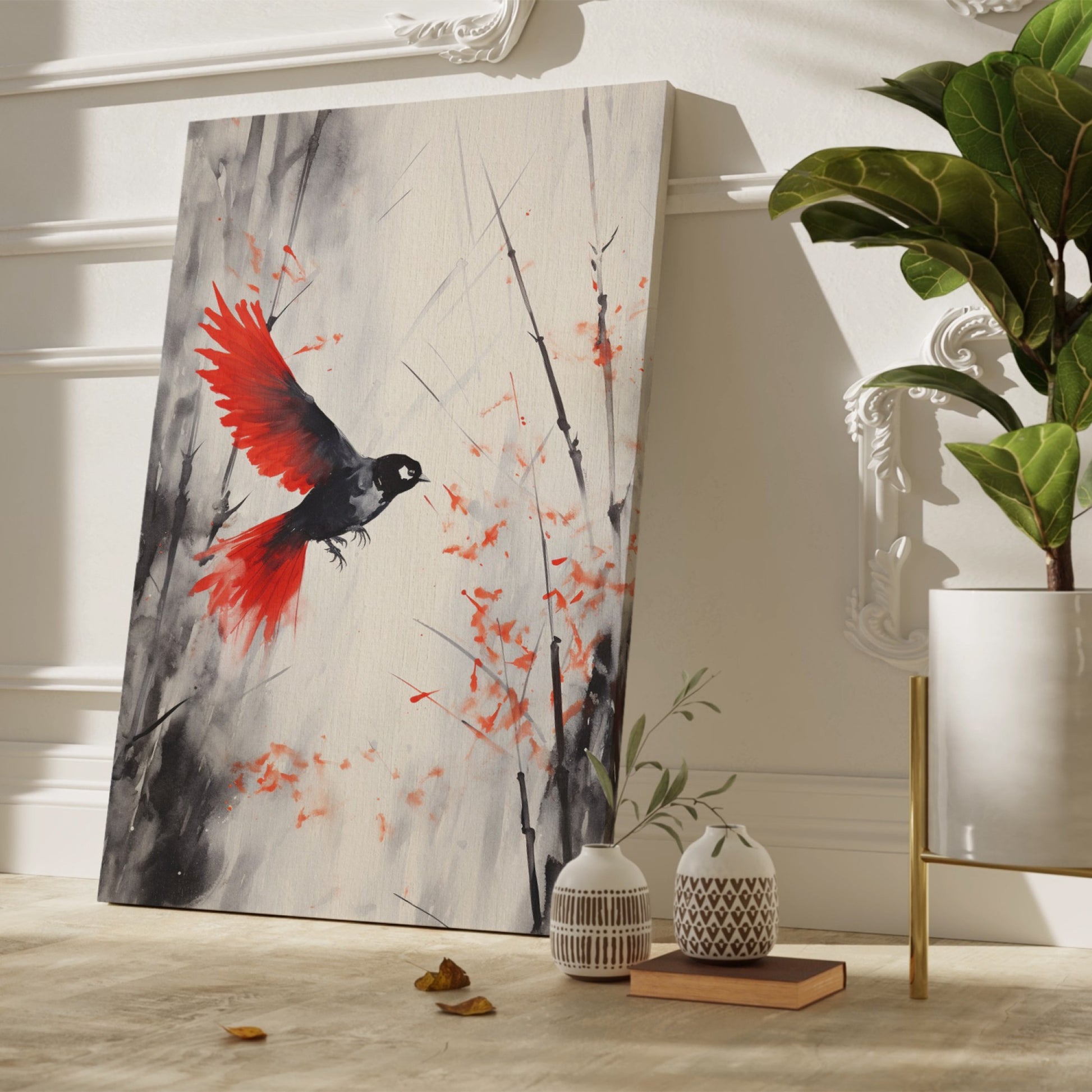 Framed canvas print of a stylised bird with vibrant red wings against a monochrome watercolor background