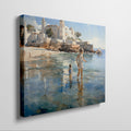 Framed canvas print of a sunlit Mediterranean beach with a mother and child