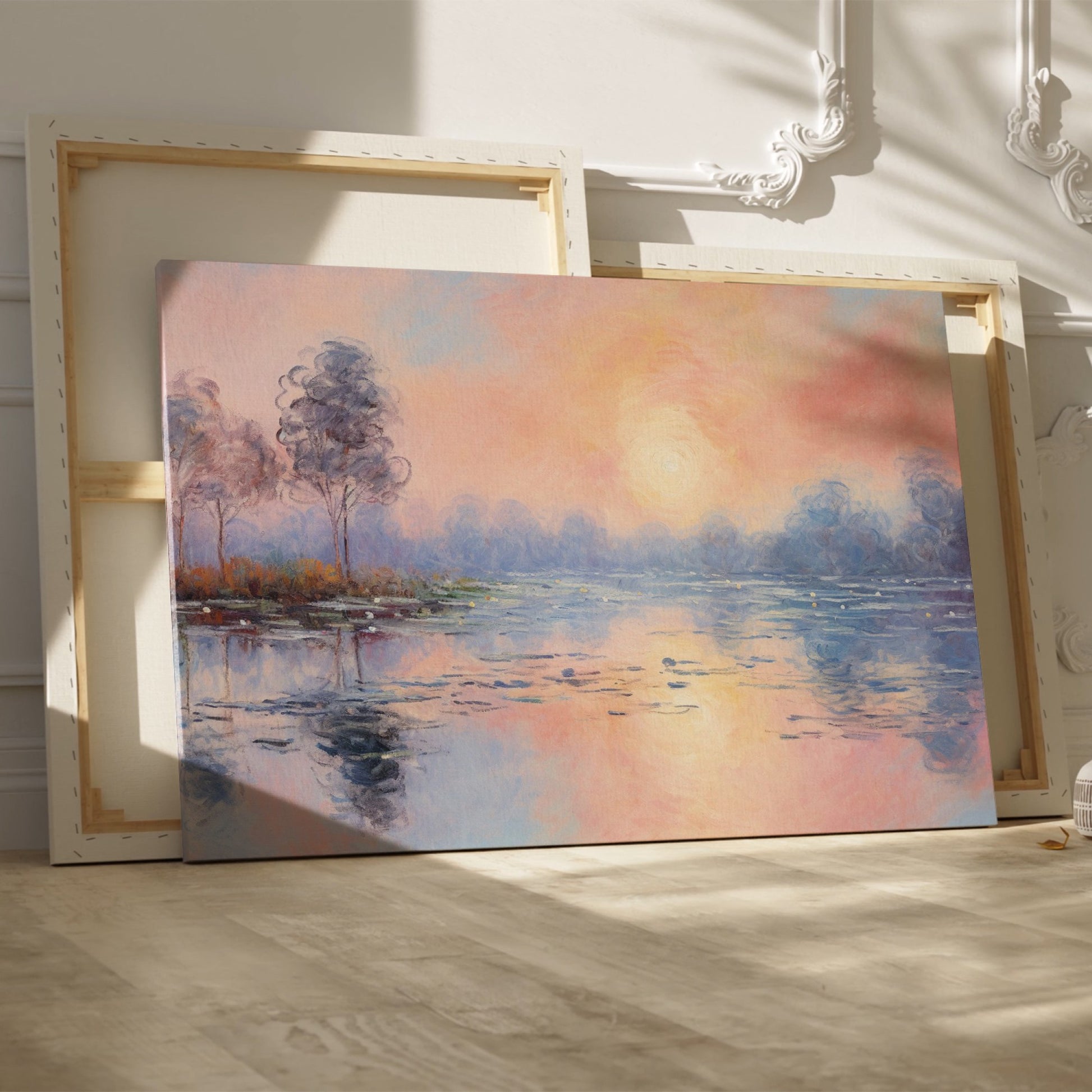 Framed canvas print of an impressionist painting depicting a serene lakeside sunrise with pastel pink and blue hues