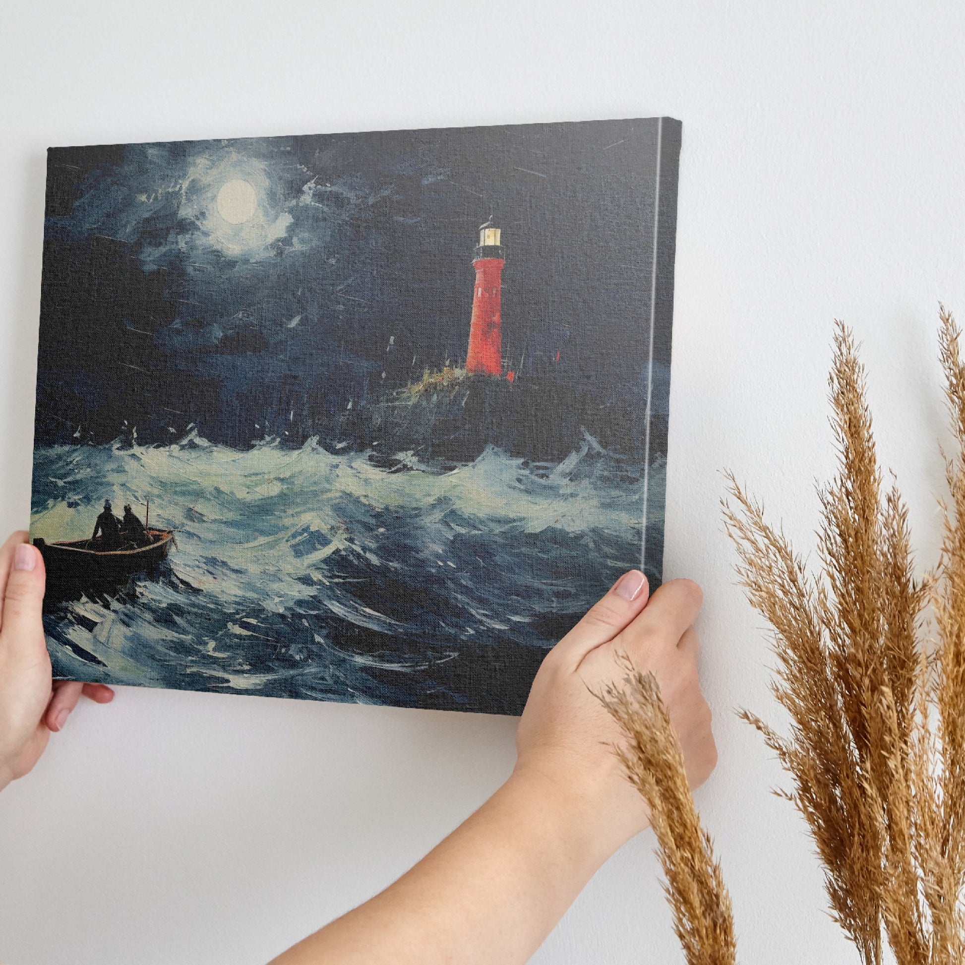 Framed canvas print of a stormy night seascape, with a red lighthouse and sailing boat under a moonlit sky