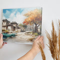 Framed canvas print of an impressionist style Oriental village scene with autumnal trees and traditional architecture