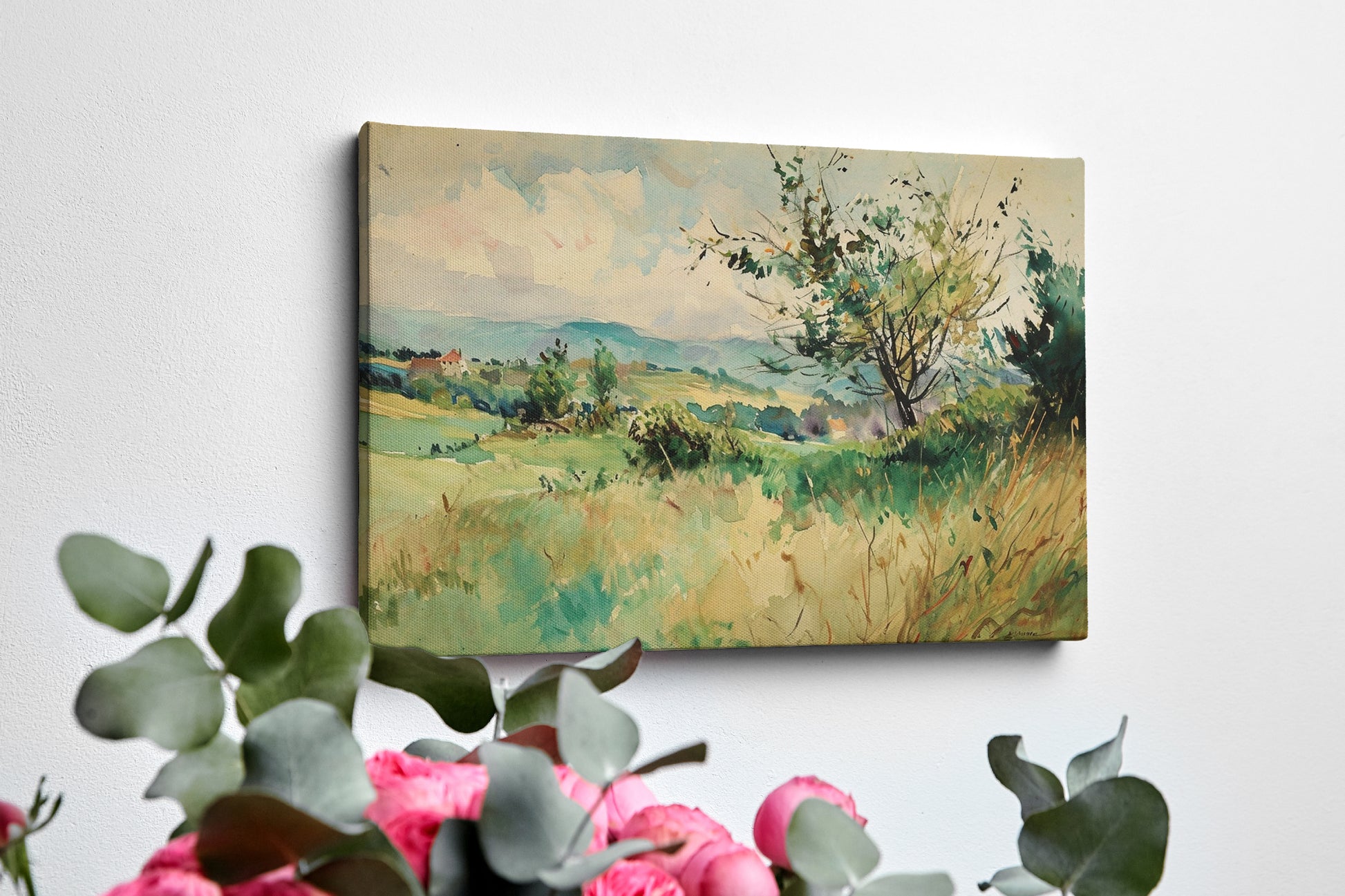 Framed canvas print of a watercolour countryside landscape with vibrant greens and soft skies