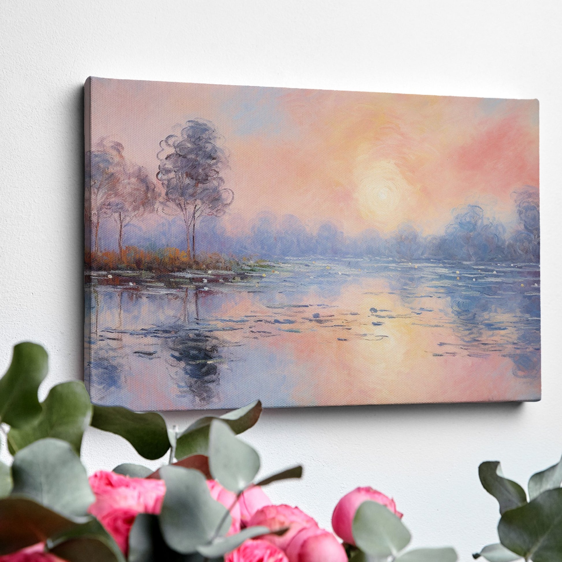 Framed canvas print of an impressionist painting depicting a serene lakeside sunrise with pastel pink and blue hues