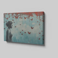 Framed canvas print of a female silhouette with red butterflies against an urban backdrop