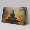 Framed canvas print of a meditative Buddha in a serene forest setting with warm, fiery orange hues