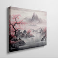 Framed canvas print of a traditional Asian landscape with cherry blossoms and misty mountains