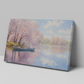 Framed canvas print of a serene river scene with cherry blossoms and a small boat