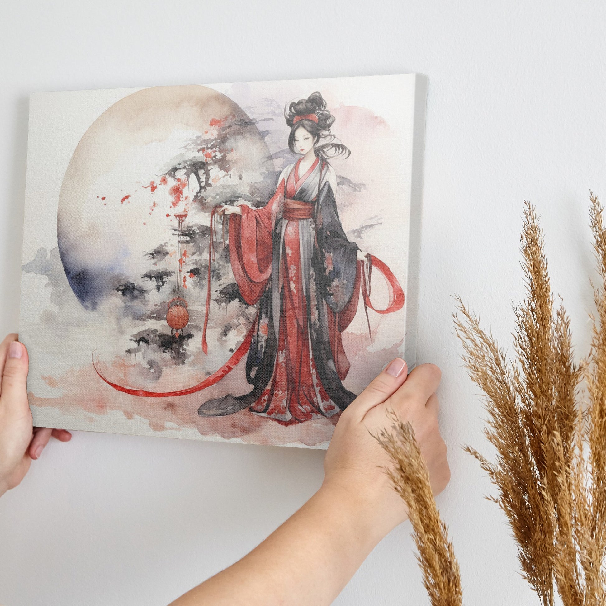 Framed canvas print of an Elegant Geisha in traditional Japanese attire with a sakura blossom and moon backdrop