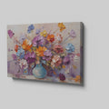 Framed canvas print of vibrant impasto bouquet in a vase with rich textures and colours