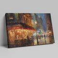 Framed canvas print of an impressionistic cityscape at twilight with a café terrace and bustling streets