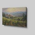 Framed canvas print of a Tuscan vineyard at sunset with warm golden hues and terracotta houses