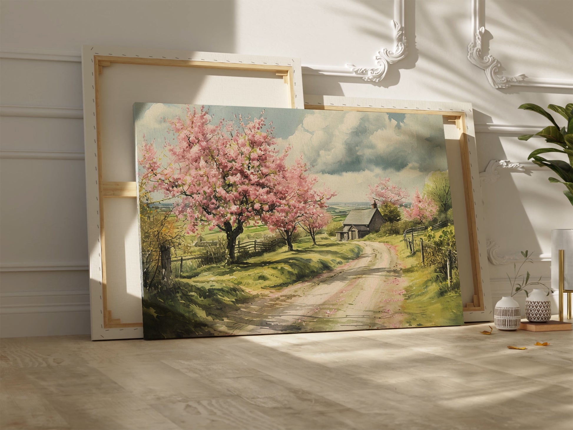 Framed canvas print of a picturesque countryside with cherry blossoms and a farmhouse