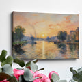 Framed canvas print of an Impressionist-style river scene with a sunset, reflective water and boats