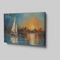 Framed canvas print of an impressionist painting with a sailboat against a sunset cityscape reflecting on the water