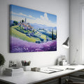 Framed canvas print of stylised Tuscan village landscape with pastel countryside and purple floral field