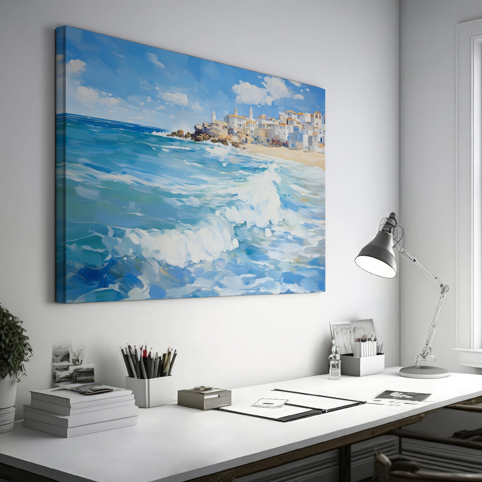 Framed canvas print of a Mediterranean village by the sea with vibrant blue waves and sunny sky