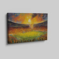 Framed canvas print of an impressionistic painting capturing a vibrant football match in a stadium at sunset