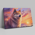 Framed canvas print of a majestic wolf against a vibrant sunset background in fiery tones