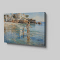 Framed canvas print of a sunlit Mediterranean beach with a mother and child