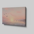 Framed canvas print of a serene seascape at sunset with flying birds and calm ocean waters