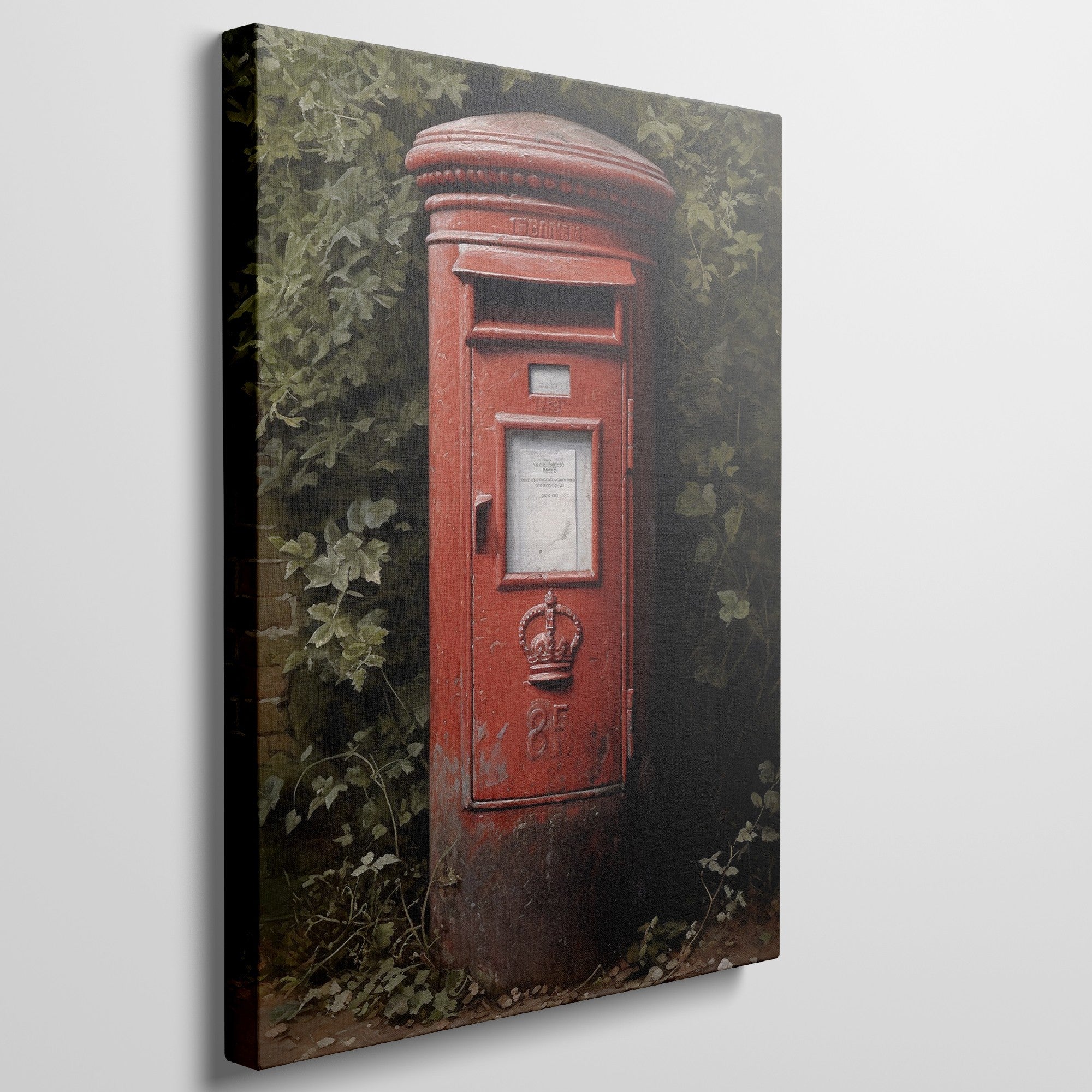 Framed canvas print of a classic British red postbox surrounded by greenery