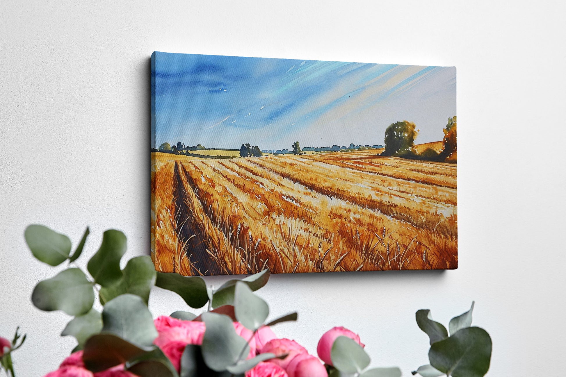 Framed canvas print of golden wheat fields under a blue sky in a rural landscape