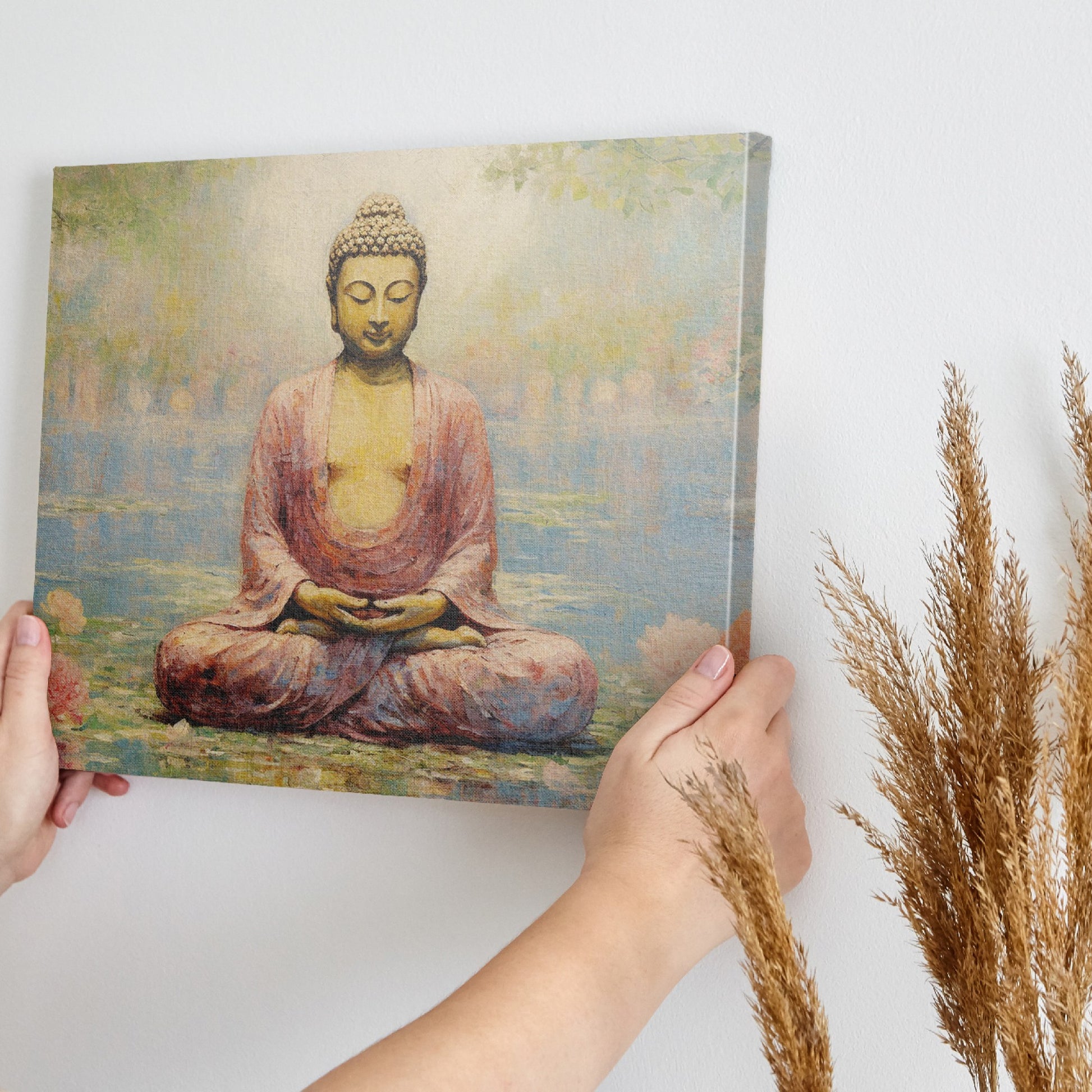 Framed canvas print of a serene Buddha in meditative pose with lotus flowers and reflective water