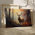 Framed canvas print of a majestic stag in an autumn forest with golden light filtering through the trees