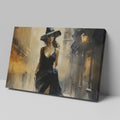 Framed canvas print of an elegant woman in a black dress with a sepia-toned urban street scene background