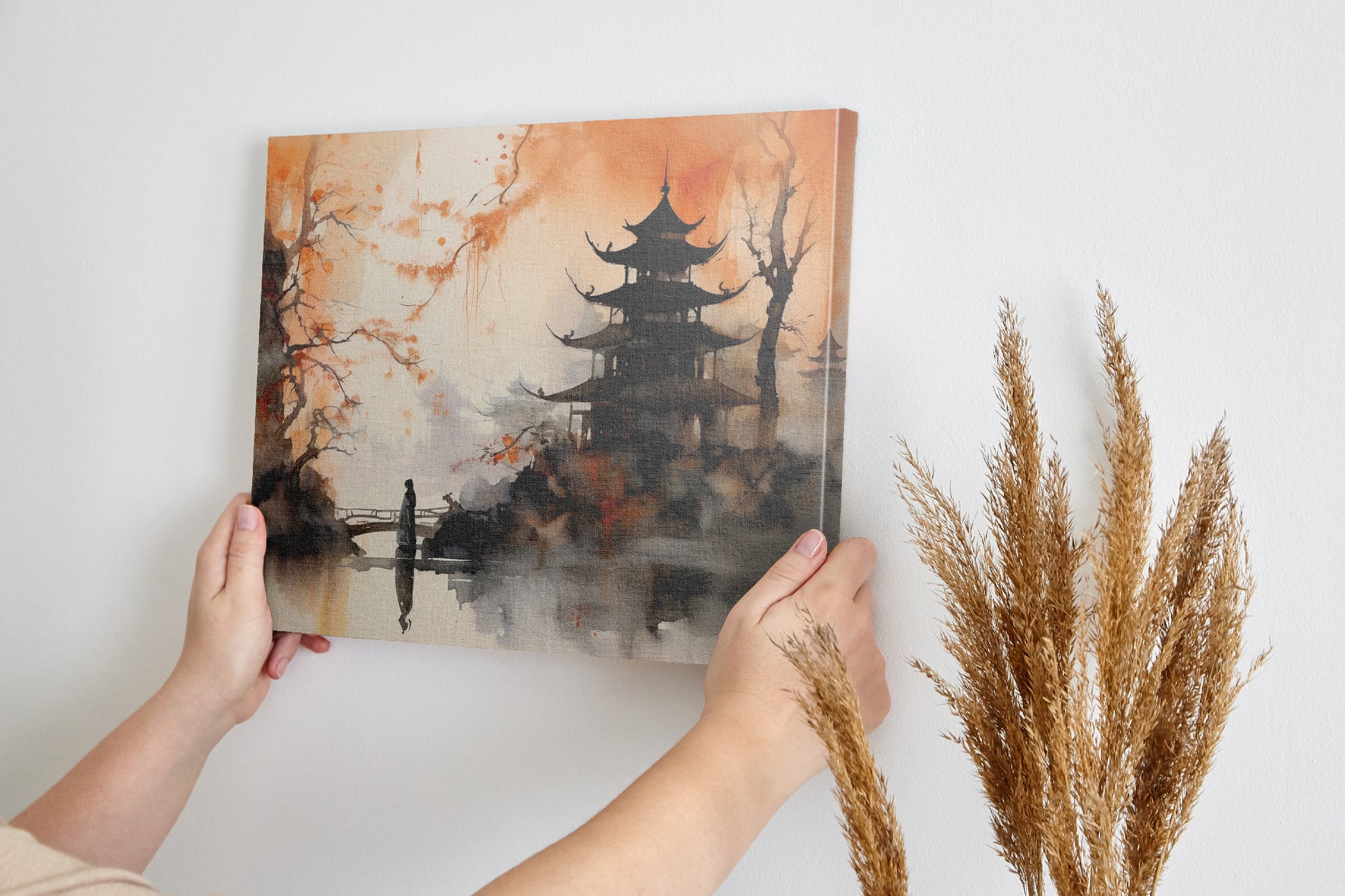 Framed canvas print of Oriental landscape with a pagoda and person on a bridge in misty watercolour technique