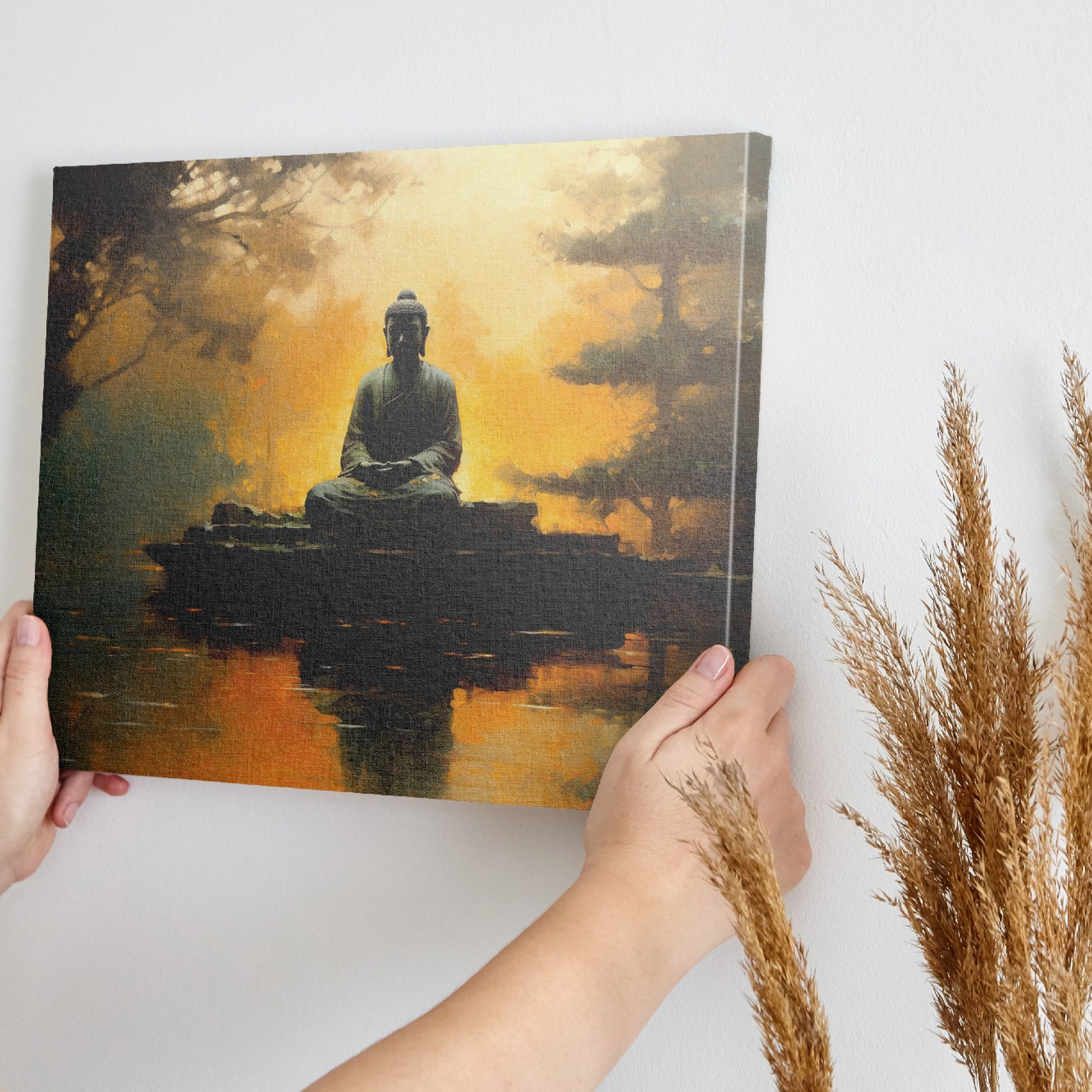 Framed canvas print of Buddha silhouette before an orange sunset with tree reflections on water