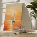 Framed canvas print of an impressionistic sunset seascape with golden colours and a sailboat