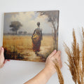 Framed canvas print of an impressionist African Savannah with a woman in traditional dress and elephant herd