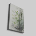 Framed canvas print of tranquil bamboo watercolour painting with soft green leaves and grey tones