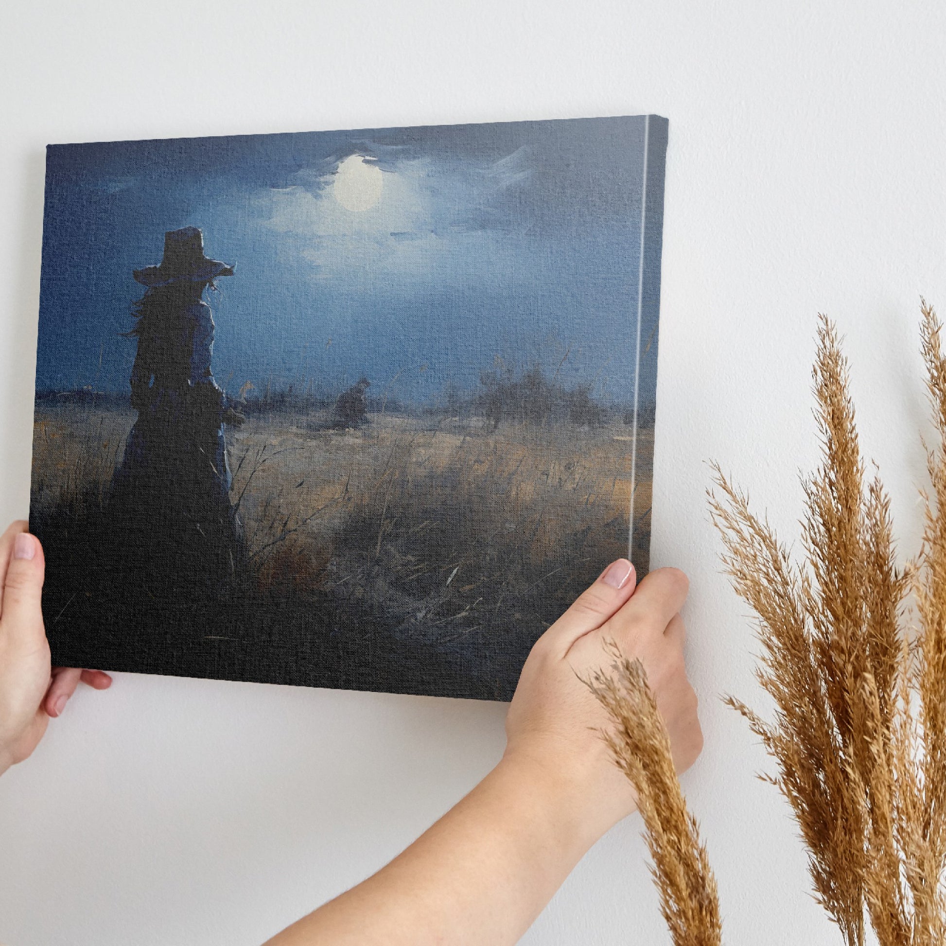 Framed canvas print of a woman in a twilight field under a glowing moon