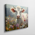 Framed canvas print of a realistic cow in a colourful meadow with wildflowers