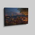 Framed canvas print of a romantic rooftop dining scene in Paris with Eiffel Tower in the background