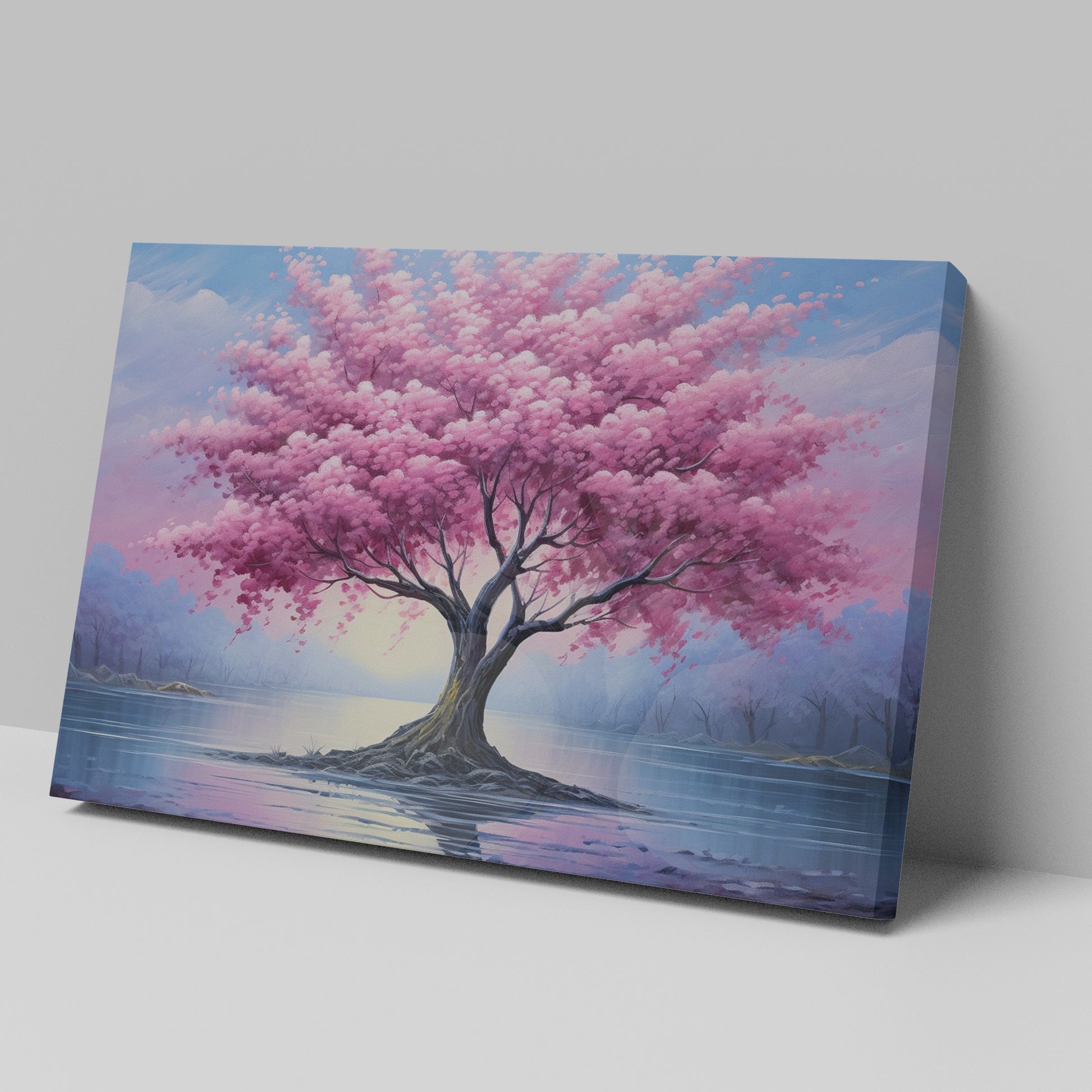 Framed canvas print of a blossoming cherry tree by the water with sunset reflection