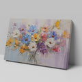 Framed canvas print of vibrant impasto painted flowers in a vase with rich textures and a colourful palette