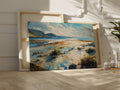 Framed canvas print of a serene watercolor painting depicting a scenic seaside landscape with vibrant blues and earthy tones