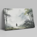 Framed canvas print featuring a solitary figure walking through a misty, ethereal bamboo forest cast in a monochrome colour scheme