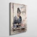 Framed canvas print of an elegant Asian woman with traditional clothing and cherry blossoms